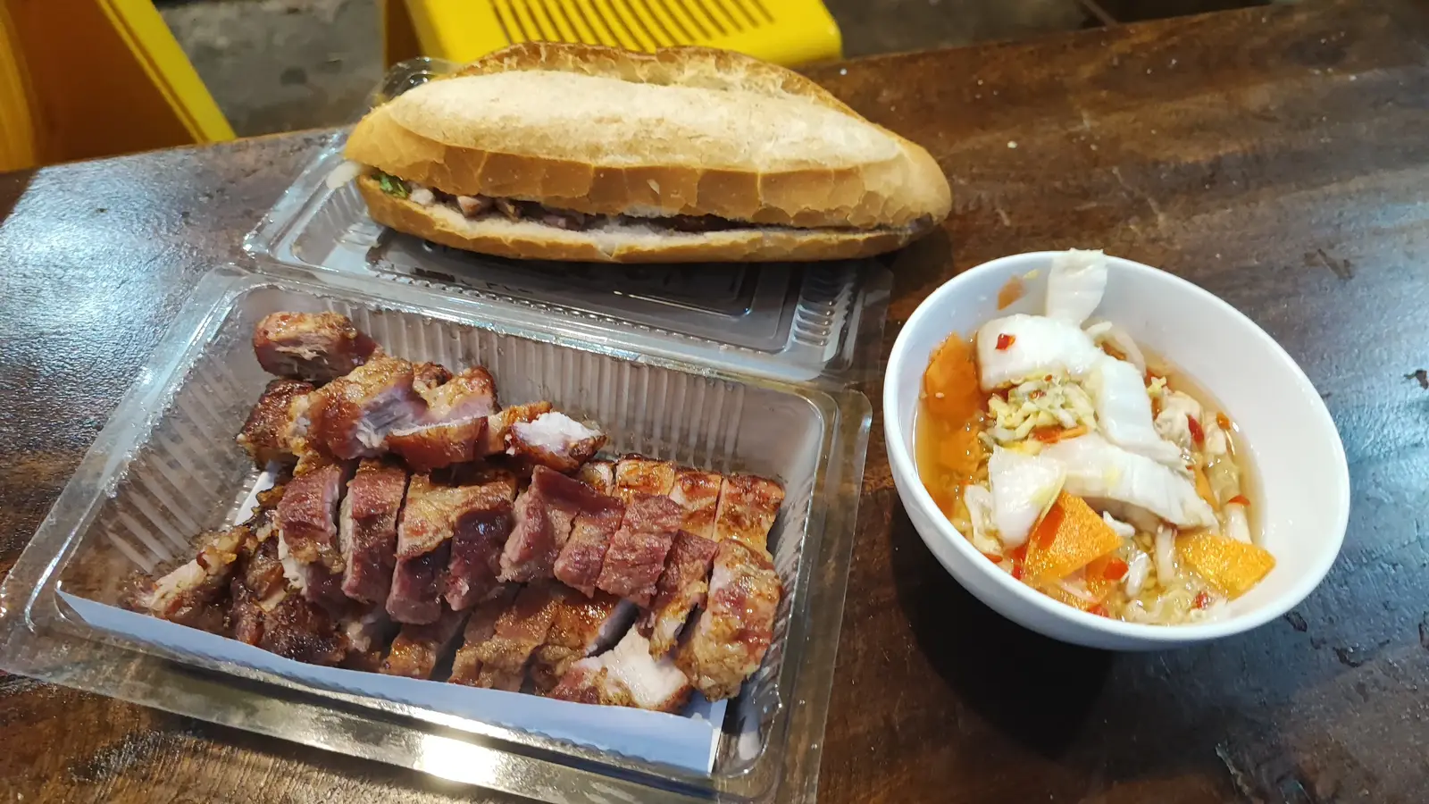 Da Nang street food banh mi with grilled pork and pickled vegetables