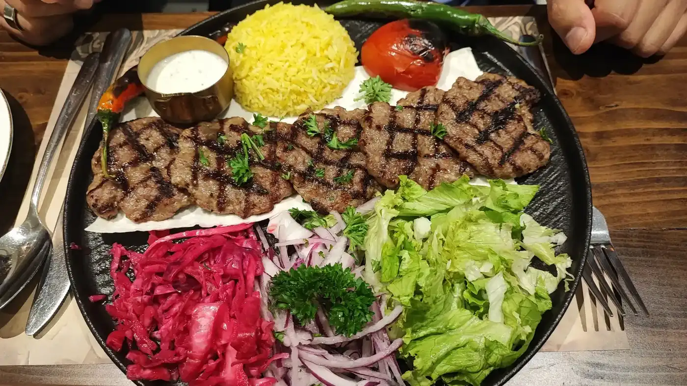 Turkish kebab plate with saffron rice at a Da Nang international restaurant