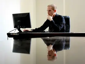 Expat working on computer in Chiang Mai
