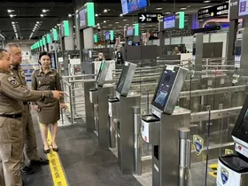 Row of biometric e-gate kiosks at Suvarnabhumi Airport