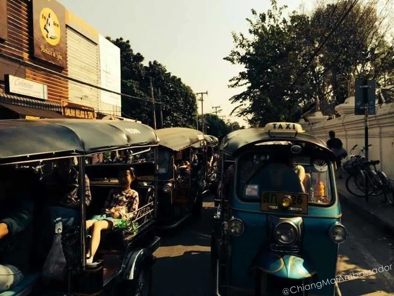 Tuk-tuk taxis queuing on Old City street in Chiang Mai